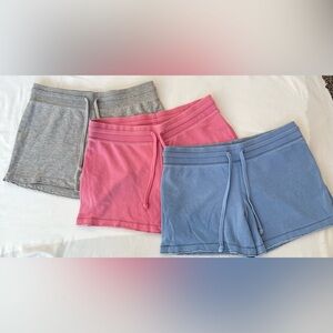 Mossimo Supply Co. Comfy set of three lounge shorts - Gray, Pink, and Blue.